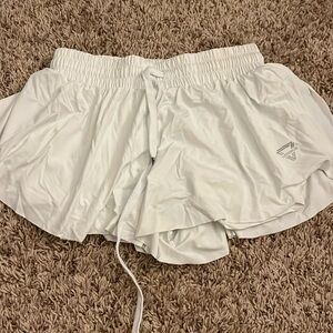 white flowy short with spandex